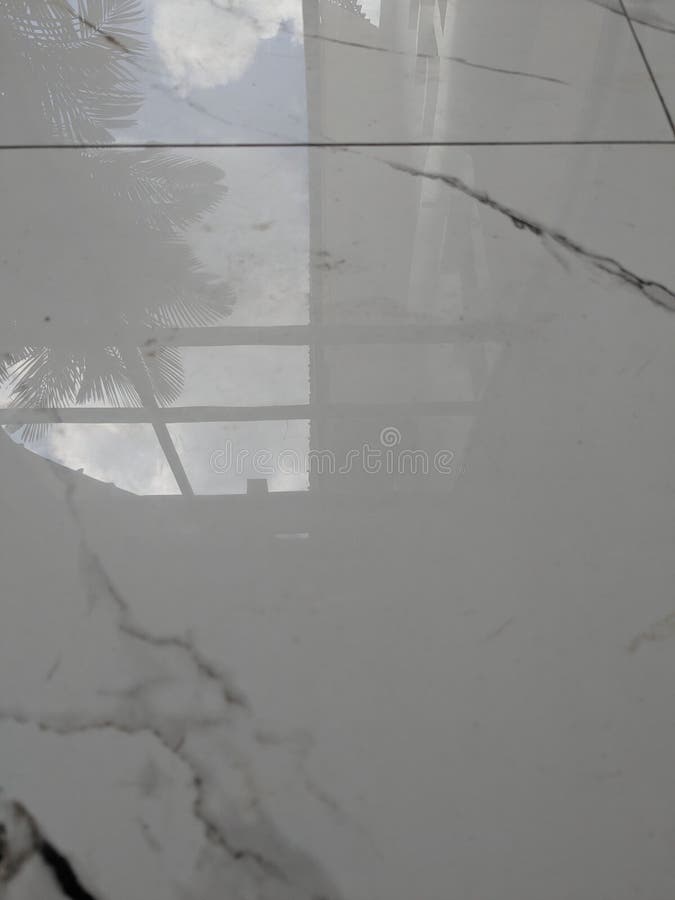 The same marble floor with a high-gloss polished finish